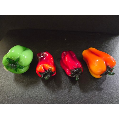 111 - Four Murano glass peppers