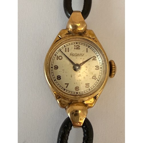 446 - A lady's 9 carat gold-cased wristwatch, the circular dial signed Rotary, with gilded Arabic numerals... 