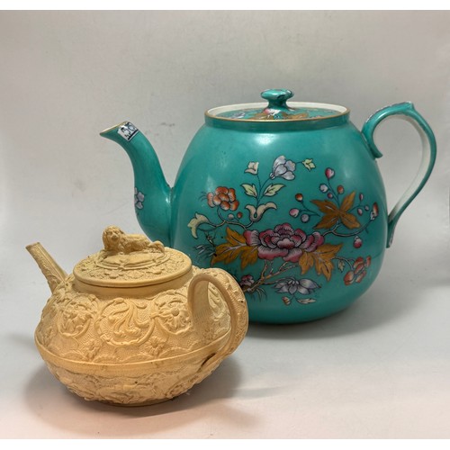 58 - A Wedgwood caneware teapot, early-mid 19th Century, with moulded floral decoration, the cover with s... 