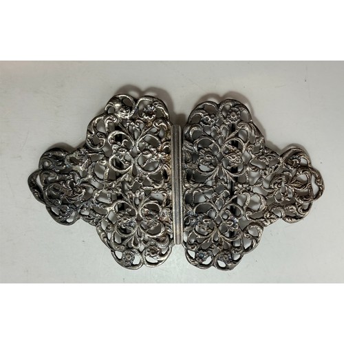 359 - Two late Victorian silver nurse's belt buckles, the first by G W Harvey & Co, Birmingham 1897, cast ... 