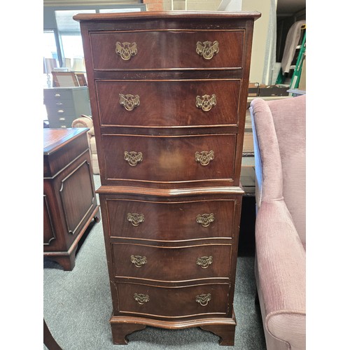811 - A mahogany serpentine tallboy chest on chest with brass swan neck handles H125cm x W49cm plus a mode... 