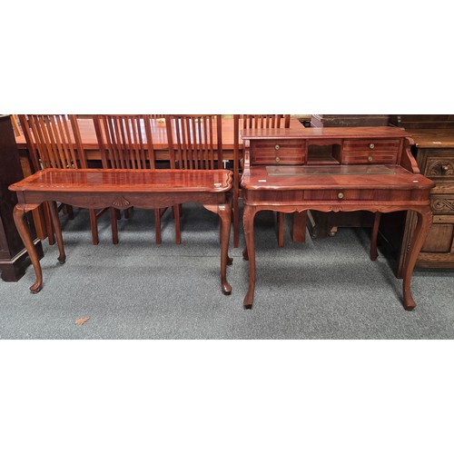 821 - A mahogany Queen Anne style desk plus veneered wood console table