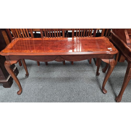 821 - A mahogany Queen Anne style desk plus veneered wood console table