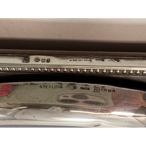 366 - An Elizabeth II silver-handled letter opener by Harrison Brothers (probably), Sheffield 1978; togeth... 