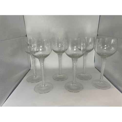 495 - Six hock glasses with air twist stems, 19.5cm high