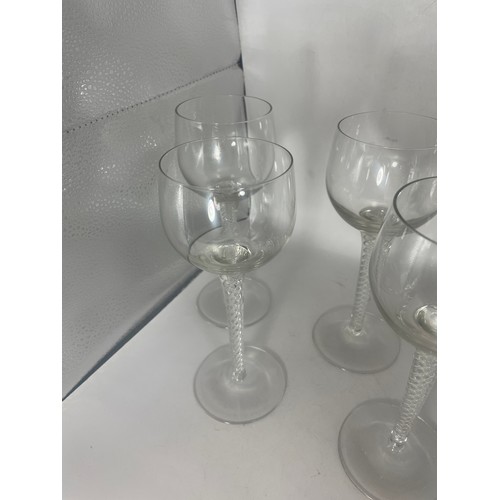 495 - Six hock glasses with air twist stems, 19.5cm high