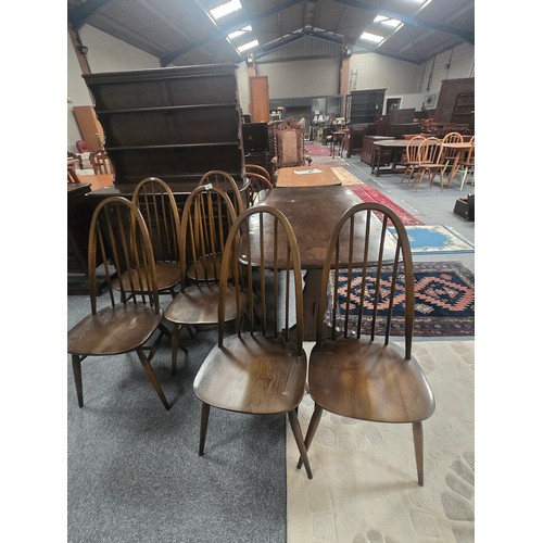 857 - Ercol 'Traditional' dark Dining table, Model 419, and 6 Quaker chairs, Mid-20th Century. Table Width... 