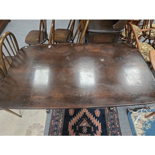 857 - Ercol 'Traditional' dark Dining table, Model 419, and 6 Quaker chairs, Mid-20th Century. Table Width... 