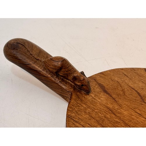 235 - A Robert Mouseman Thompson adzed oak cheeseboard, the handle with carved mouse, 38cm wide