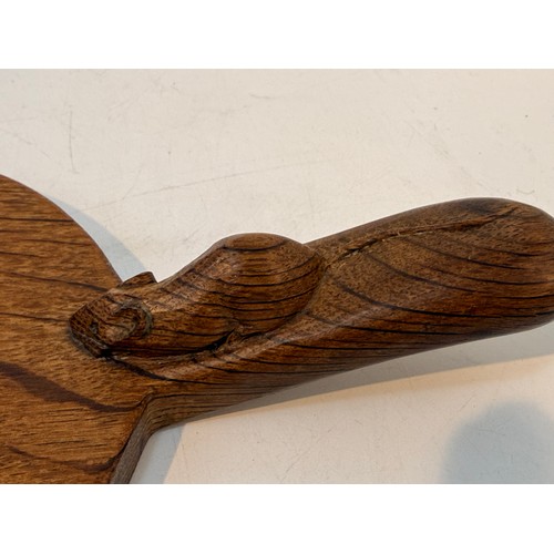 235 - A Robert Mouseman Thompson adzed oak cheeseboard, the handle with carved mouse, 38cm wide
