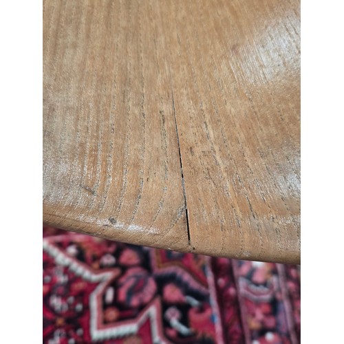 859 - A blonde Ercol mid-century 'Windsor' drop-leaf extending dining table, designed by Lucian Ercolani f... 