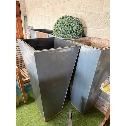 953 - Five large tapering oblong metal planters, and two similar smaller examples. (7) 115cm high and smal... 