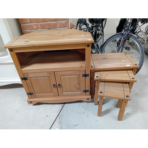 1111 - A modern pine nest of tables and matching cabinet