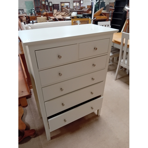 1126 - An M&S 5 height chest of drawers in cream with chrome knobs. 1.2m h x 85cm x 45cm