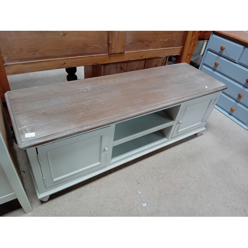 1127 - A modern painted and wood finish low cupboard. 
1.45m x 45cm