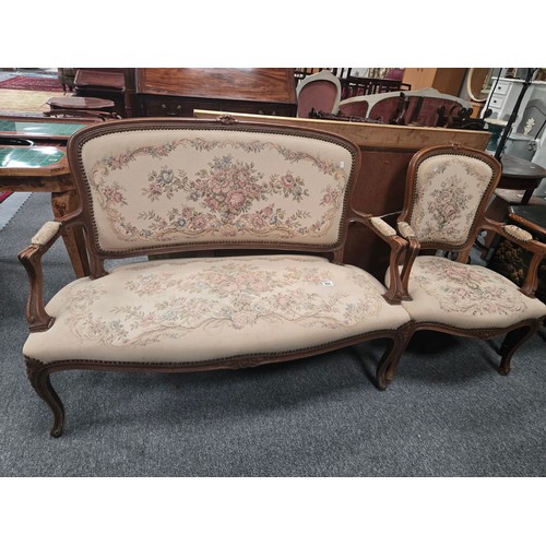 895 - A Louis XVI style sofa and armchair with carved frame and needlepoint floral tapestry W120cm
