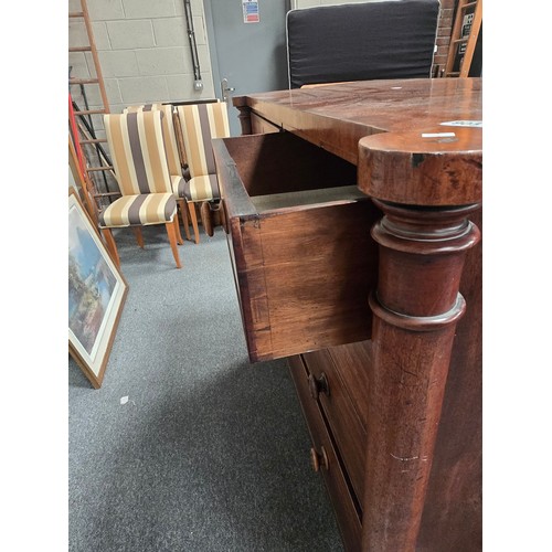 905 - A Victorian Mahogany chest of drawers, two short over three long, with turned column uprights and tr... 