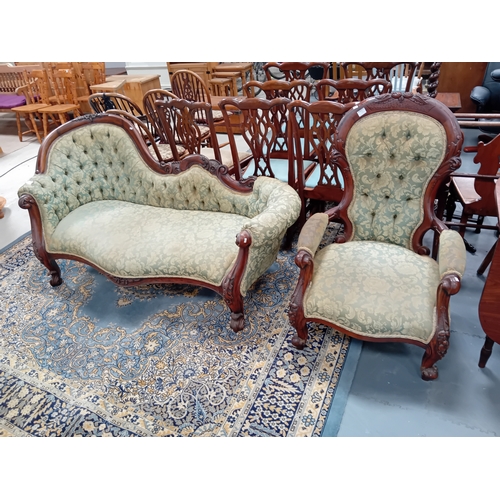 1099 - A reproduction Victorian style chaise longue and matching arm chair