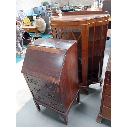 1088 - A 20th century mahogany vitrine and bureau