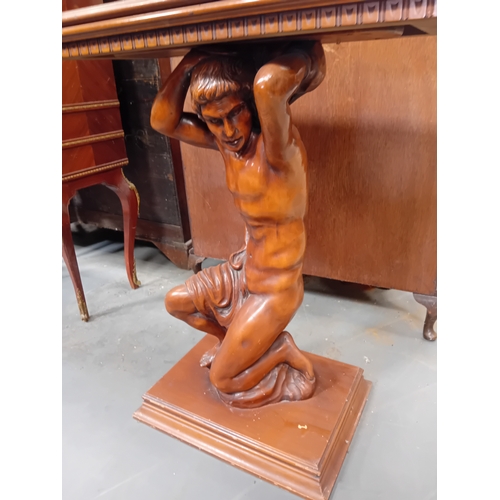 1057 - A mahogany swivel top side table with Greek God central pillar.