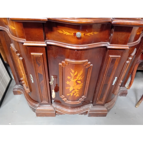1055 - An Italian style mahogany and marquetry display cabinet.