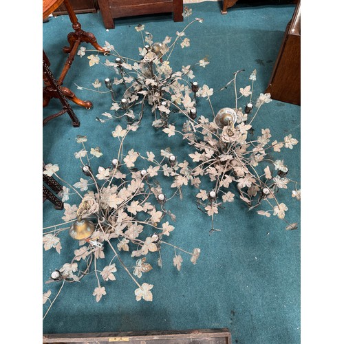 1000 - Three six-light metal leafy branch chandeliers. (3)