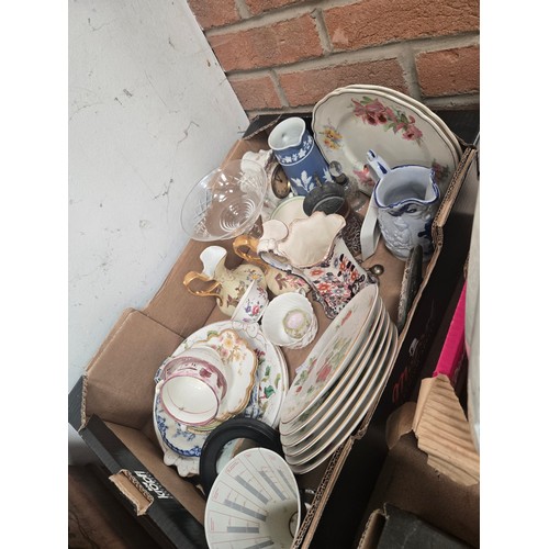 1213 - Three boxes of miscellaneous items including oil lamp, blue and white plates, vintage sewing machine... 