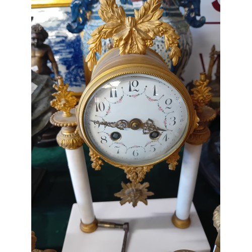 6A - An Antique clock garniture set in gilt and white marble with decorative porcelain face.