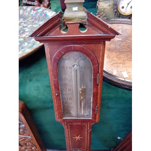 30 - An Antique mahogany and inlaid stick barometer made by Yeates 29 Chapel Street Dublin in good condit... 