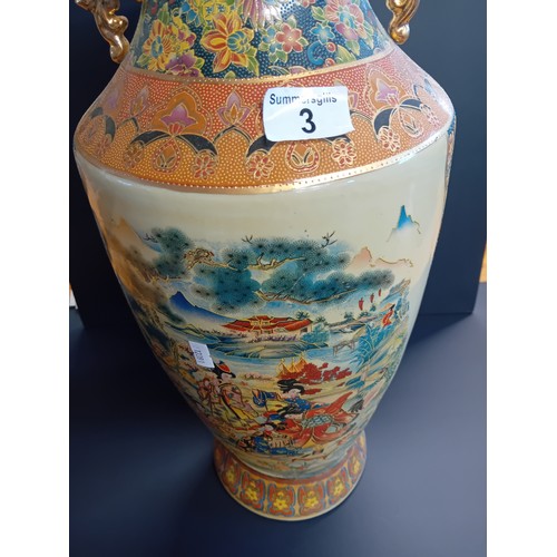 3 - A 20th century decorative vase in the Satsuma or Morriage style.  Height 60cm