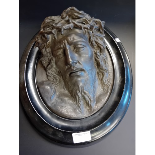 5 - A pair of bronze relief plaques.  One depicting Jesus Christ with a crown of thorns.  The other plaq... 