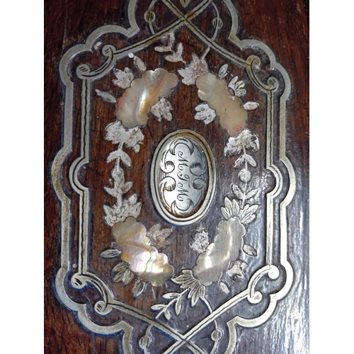 7 - Victorian rosewood with inlaid mother of pearl writing slope.  With key.  Red leather interior with ... 