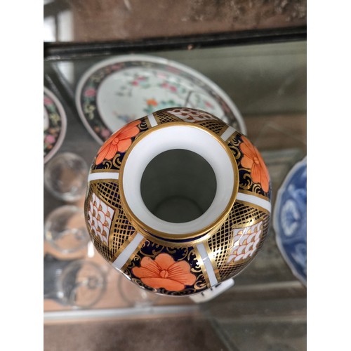 142 - Royal Crown Derby vase with flared neck, 17cm high