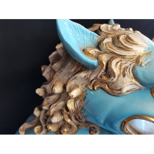 26 - A pair of Chinese Turquoise blue large ceramic Foo Dog Statues. H 58cm W 24cm D 39cm
