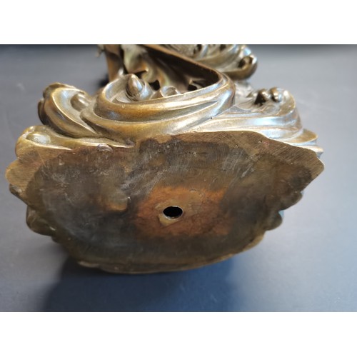 27 - A cast bronze statue of Guanyin, the East Asian Bodhisattva of Mercy and Compassion.  H 40cm