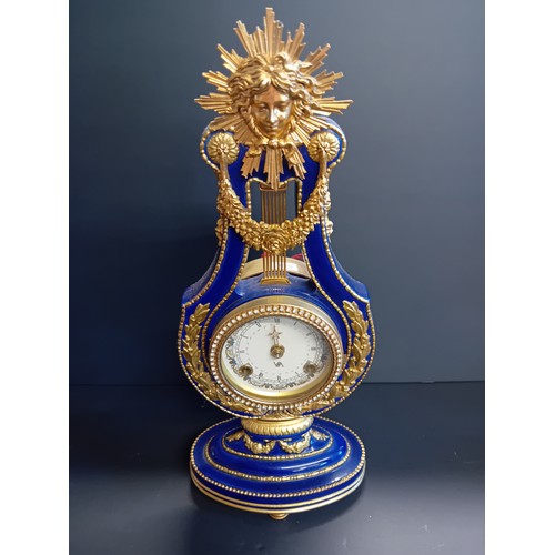 31 - Franklin Mint Victoria and Albert V&A museum 'Marie Antoinette Mantel Clock' of lyre form.  Cobalt b... 