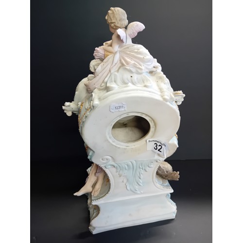 32 - Continental porcelain mantel clock.  Rococo style gilded details and figural sculptures.  Mercedes c... 
