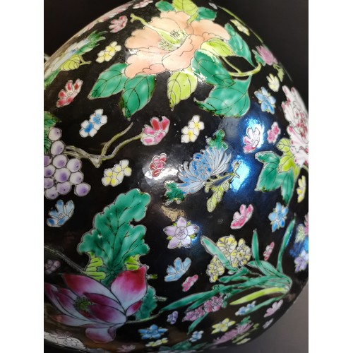 34 - A large Chinese Famille Noire bottle neck vase, 53cm high