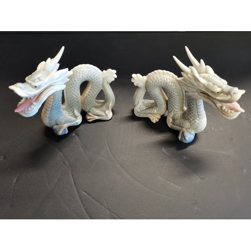 55 - A Pair of Vintage Royal Crown Derby Peacocks H21cm plus Four vintage Yoshimi K porcelain foo dragon ... 
