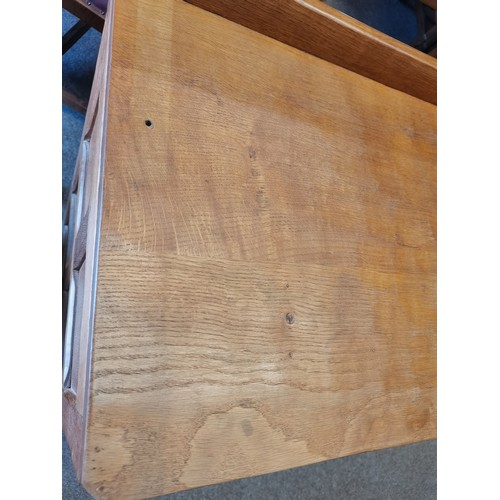 639 - Trevor Hutchinson, a Squirrelman oak dresser and plate rack, adzed, with two cupboards and four draw... 