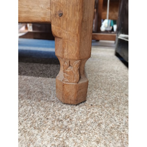 639 - Trevor Hutchinson, a Squirrelman oak dresser and plate rack, adzed, with two cupboards and four draw... 