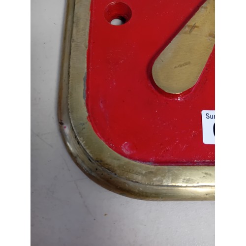 690 - Vintage sign with brass border and raised numbers 