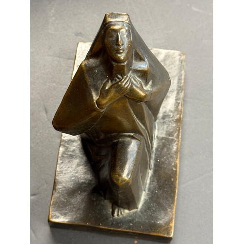 68 - Jocelyn Horner (1902-1973), Kneeling nun with hands clasped to breast, bronze, Art Deco angular styl... 