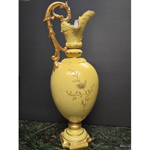82 - A Royal China Works yellow and gilt decorated ewer, 43cm high.. Grainger works late 19th century 
( ... 