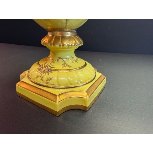 82 - A Royal China Works yellow and gilt decorated ewer, 43cm high.. Grainger works late 19th century 
( ... 