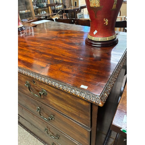627 - A Georgian mahogany four height chest of drawers, having two short over three long drawers with carv... 