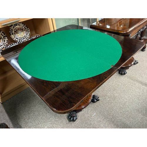 598 - A pair of William IV rosewood pedestal card tables, having a carved frieze above swept support on ci... 