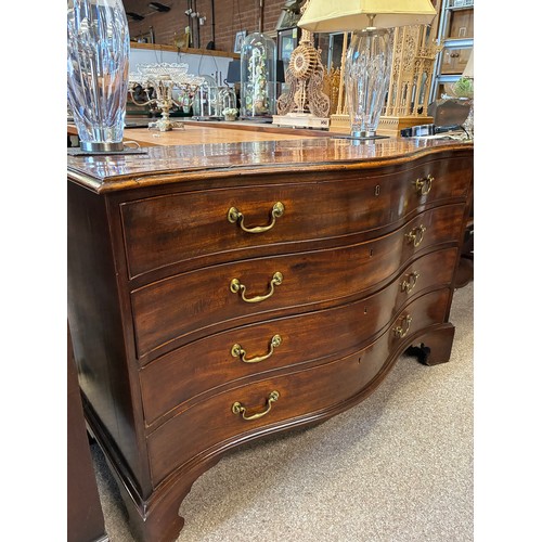 639 - A Regency mahogany serpentine chest of drawers, comprising four drawers with brass swan neck handles... 