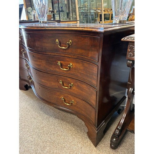 639 - A Regency mahogany serpentine chest of drawers, comprising four drawers with brass swan neck handles... 