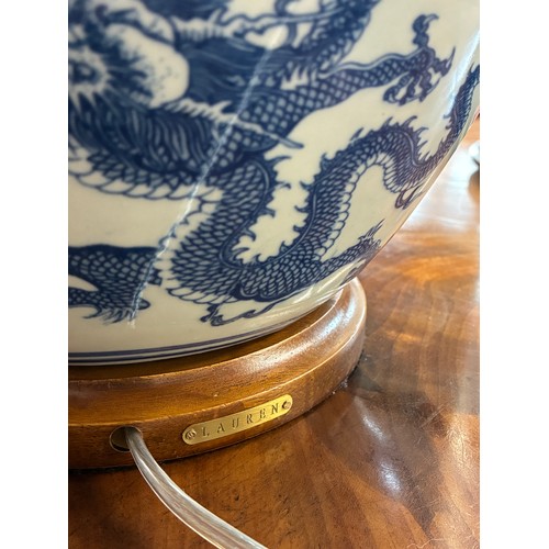 648 - A Ralph Lauren continental style blue and white lamp, painted with dragons, with cream shade, 56cm h... 